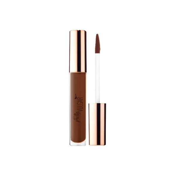 Under Cover Concealer | Pretty Vulgar in a rich brown shade with a sleek rose gold cap and applicator wand, designed for seamless coverage and flawless skin finish.