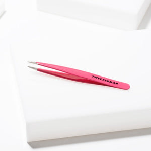 Pretty In Pink Point Tweezer | Tweezerman with a sharp, precise tip in vibrant pink, ideal for delicate skincare and beauty grooming tasks.