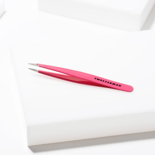 Pretty In Pink Point Tweezer | Tweezerman with a sharp, precise tip in vibrant pink, ideal for delicate skincare and beauty grooming tasks.