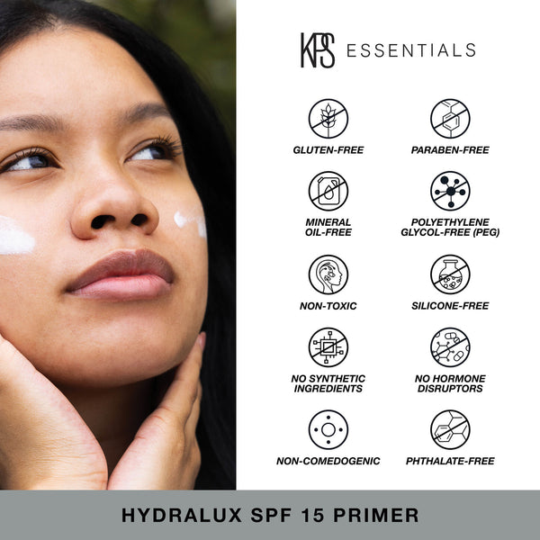 Woman applying Hydralux SPF 15 Primer | Kindness Powered Skincare with visible icons highlighting the product’s gluten-free, paraben-free, mineral oil-free, PEG-free, non-toxic, silicone-free, no synthetic ingredients, no hormone disruptors, non-comedogen
