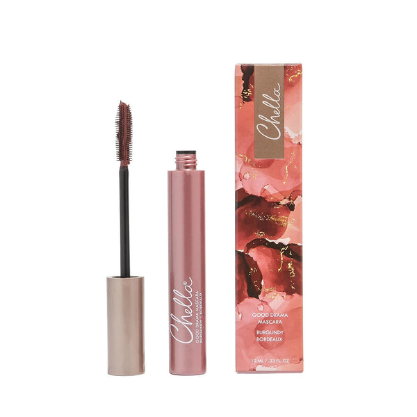 Good Drama Mascara | Chella in a burgundy shade with a sleek tube and matching box featuring artistic red and pink floral design accents.