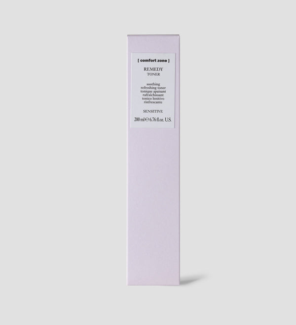Minimalist light purple packaging of Remedy Toner | [ comfort zone ] showing product details for a soothing, refreshing toner designed for sensitive skin in a skincare collection.