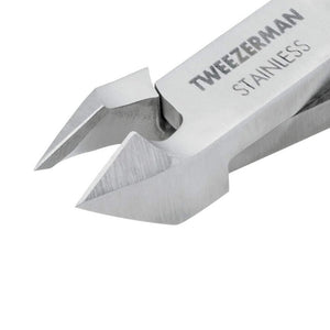 Close-up view of stainless steel Rockhard Cuticle Nipper | Tweezerman with sharp, precise curved blades designed for skincare and body care nail grooming.