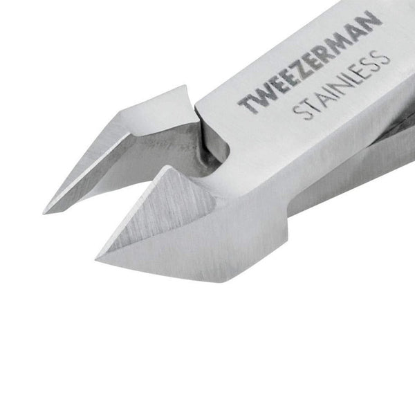 Close-up view of stainless steel Rockhard Cuticle Nipper | Tweezerman with sharp, precise curved blades designed for skincare and body care nail grooming.