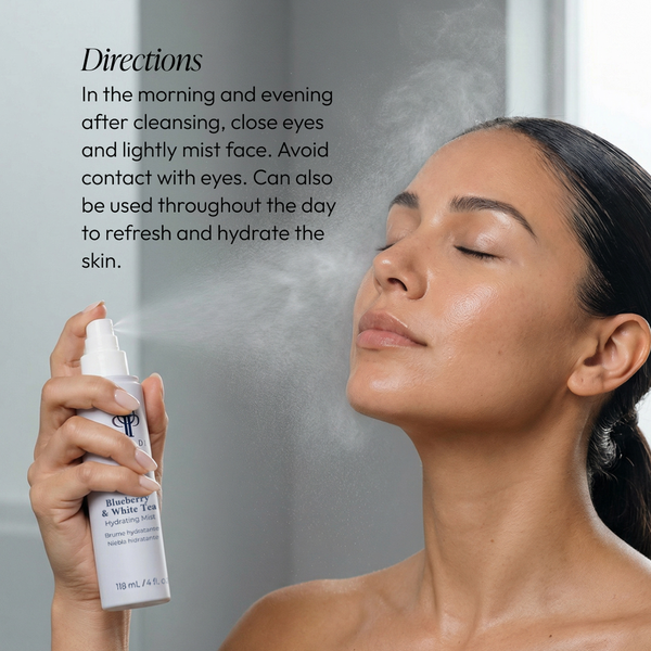 Woman with eyes closed spraying Blueberry & White Tea Hydrating Mist | Circadia onto her face to refresh and hydrate skin as part of a skincare routine.