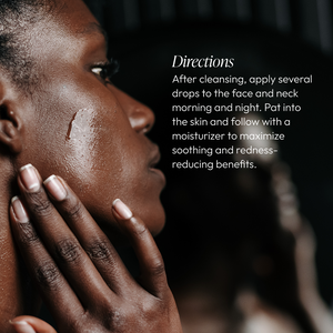 Close-up of a person applying Chrono-Calm | Circadia serum to their cheek with visible texture of the calming skincare product on the skin, demonstrating a soothing skincare routine.