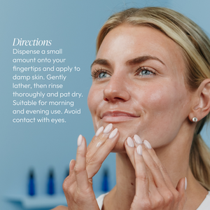 Woman gently applying Micro-Exfoliating Honey Cleanser - 2 oz | Circadia to her face with fingertips, demonstrating skincare directions for a morning or evening routine.