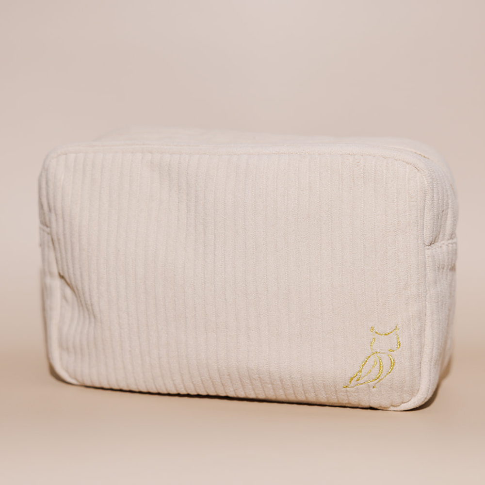 Soft beige corduroy Luxe Travel Bag | Lucky Owl with subtle owl embroidery on the corner, designed for stylish and practical travel organization.