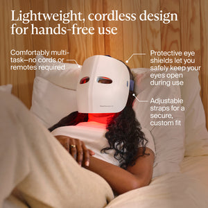 Person relaxing while wearing the TheraFace Mask Glo | Therabody, a lightweight cordless skincare device with protective eye shields and adjustable straps for hands-free use and a custom fit.