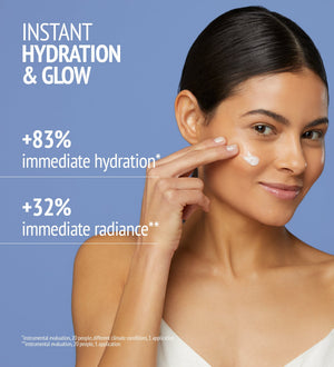 Woman applying Hydramemory Water Source Serum | [ comfort zone ] on her cheek, promoting instant hydration and glow with improved skin radiance and moisture benefits.