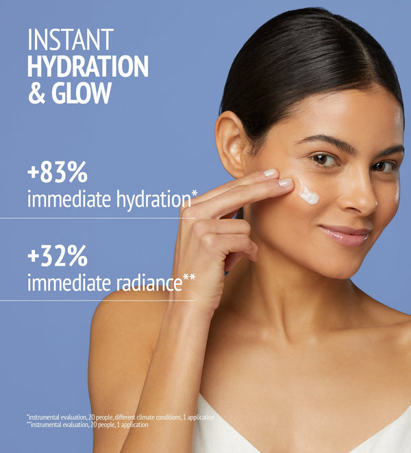 Woman applying Hydramemory Water Source Serum | [ comfort zone ] on her cheek, promoting instant hydration and glow with improved skin radiance and moisture benefits.