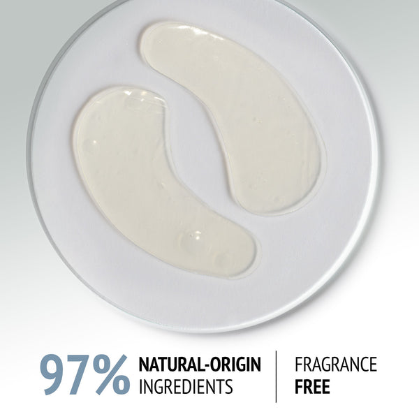 Clear gel eye patches shaped to fit under the eyes, displayed on a white plate, promoting skincare with Sublime Skin Eye Patch | [ comfort zone ] featuring 97% natural-origin ingredients and fragrance free.