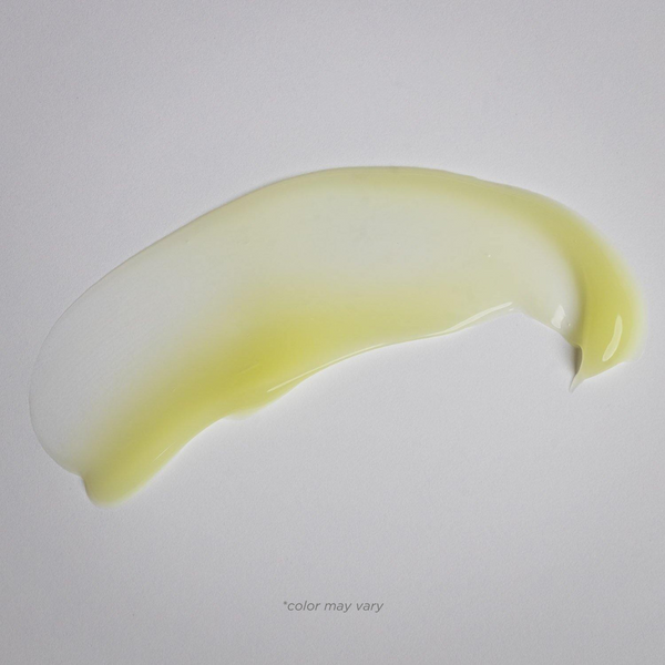 Close-up of a smooth, translucent yellow gel smear showcasing the texture of Skin Repair Gel | Alchimie Forever, highlighting its skincare and body care benefits.