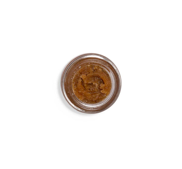 Top view of a jar containing Beach Punch® Lip Polish | Farmhouse Fresh, showing its rich, textured brown exfoliating lip treatment for skincare and body care.