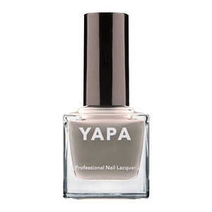 Charlotte Nail Lacquer | YAPA in a sleek glass bottle featuring a muted taupe shade of professional nail lacquer with a black cap for a polished manicure look.