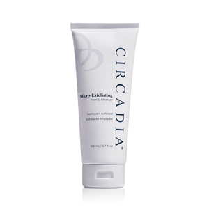 Tube of Micro-Exfoliating Honey Cleanser | Circadia in white packaging designed for skincare, displayed against a plain white background.