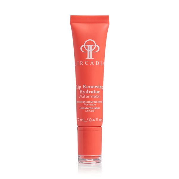 Tube of Lip Renewing Hydrator - Watermelon | Circadia in coral packaging designed for skincare with a clear applicator tip, promoting lip hydration and renewal.