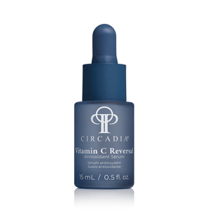 Blue dropper bottle of Vitamin C Reversal Antioxidant Serum | Circadia skincare product designed to promote skin health and antioxidant protection.