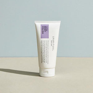 Tube of Earl Grey BODY POLISH | Sparitual standing on a neutral surface, featuring minimalist packaging designed for skincare and body care wellness routines.
