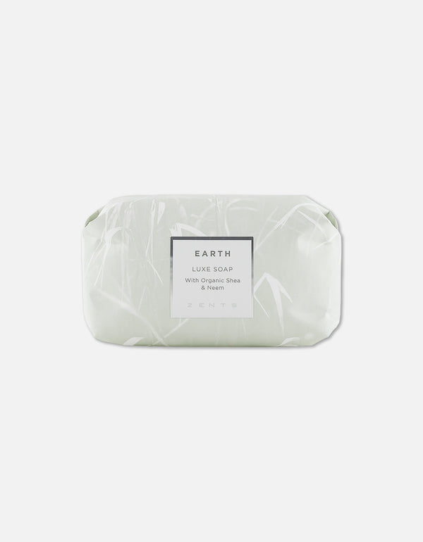 Luxe Soap Bar | Zents Earth edition wrapped in pale green packaging with delicate botanical design, promoting natural skincare with organic shea and neem for body care.