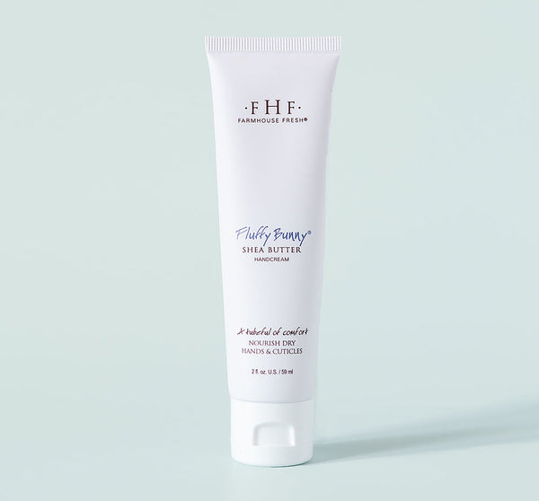 Fluffy Bunny® Shea Butter Hand Cream | Farmhouse Fresh in a white tube designed to nourish dry hands and cuticles, promoting soft and hydrated skin with rich shea butter.