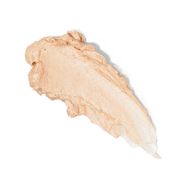 Swatch of Golden Moon Dip® Illumination Mousse with Retinol + Wrinkle-Targeting Peptides | Farmhouse Fresh showing a creamy, light beige skincare mousse texture for radiant skin care.
