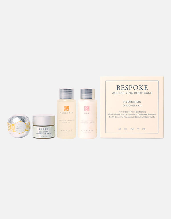 Bespoke Hydration Discovery Kit | Zents featuring mini sizes of body care essentials including lotion, balm, bath truffle, and oil for skincare and wellness.