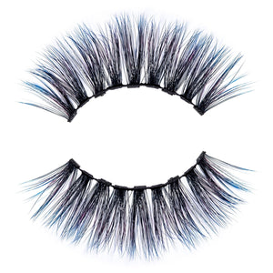 Close-up of a pair of dramatic false eyelashes with subtle colored accents, designed for enhancing eye makeup, labeled Stormy Lash - Colored | Moxielash.
