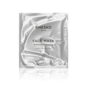 Packaging of Diamond Radiance Face Mask - Single | Knesko in a sleek, silver foil pouch designed for skincare hydration and radiance enhancement.