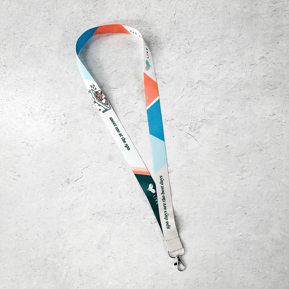 Lanyard - Massage Lover, Color Block and Live Love Spa | Lucky Owl featuring a colorful geometric pattern with blue, orange, and white sections, designed for wellness and spa enthusiasts.