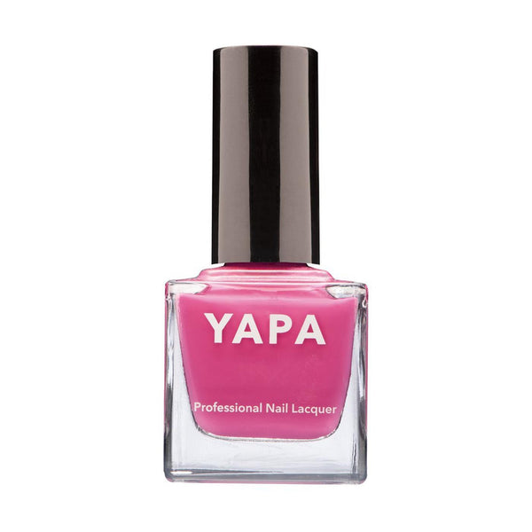 Bottle of Lily Nail Lacquer | YAPA in vibrant pink shade with black cap, designed for professional nail care and manicure use.