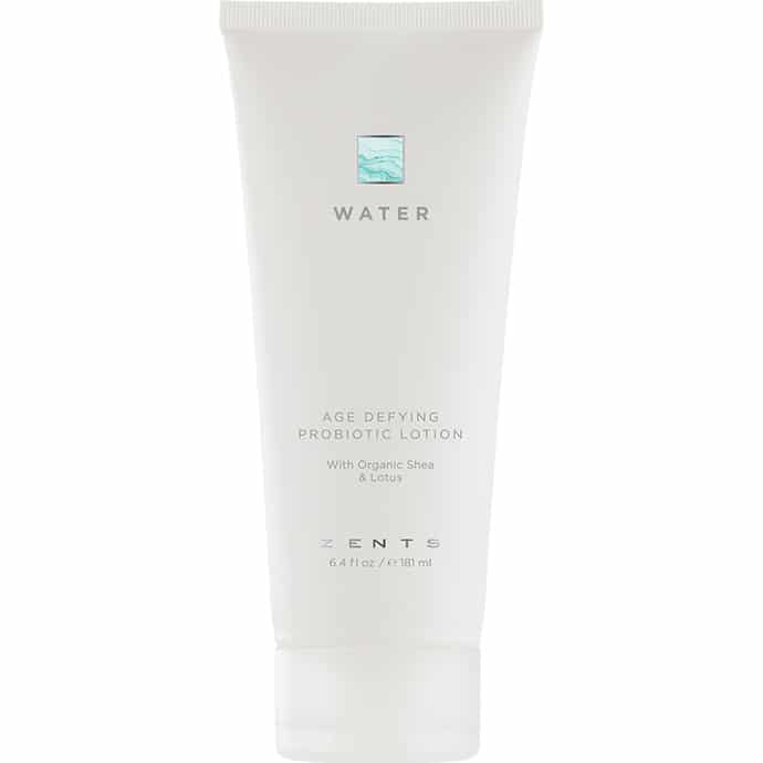 White tube of Age Defying Probiotic Lotion | Zents from the Water collection, featuring minimalist design and labeled with organic shea and lotus ingredients for skincare.