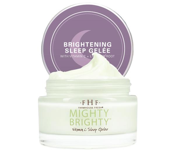 Jar of Mighty Brighty™ Vitamin C + Licorice Root Brightening Sleep Gelée | Farmhouse Fresh with creamy white gel and purple lid labeled Brightening Sleep Gelée with Vitamin C + Licorice Root.