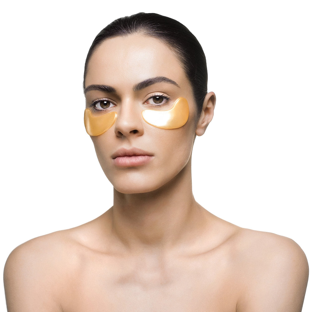 Woman wearing Nanogold Repair Eye Mask - 6 pack | Knesko under-eye patches for skincare and wellness, promoting refreshed and rejuvenated skin.