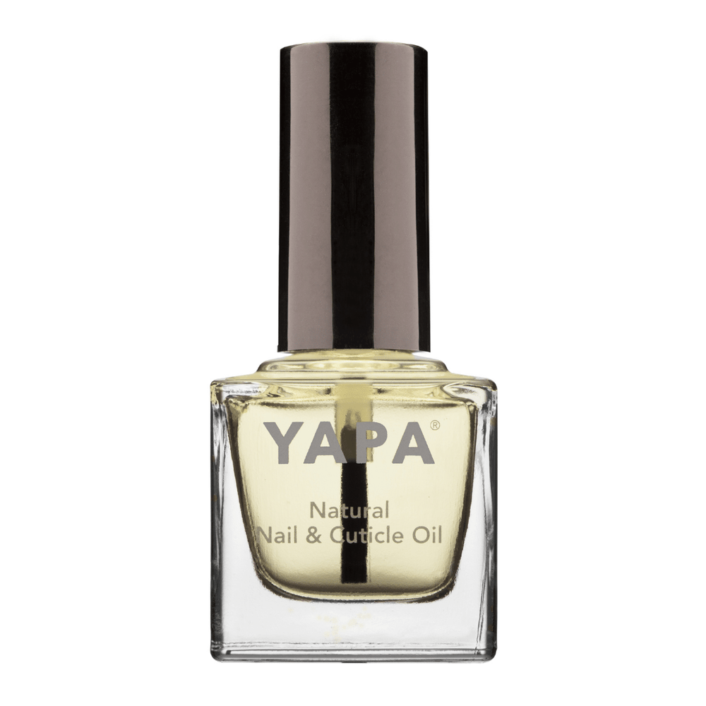 Bottle of Natural Cuticle Oil | YAPA, a clear glass container with pale yellow oil and a black cap, designed for skincare and nail care wellness.