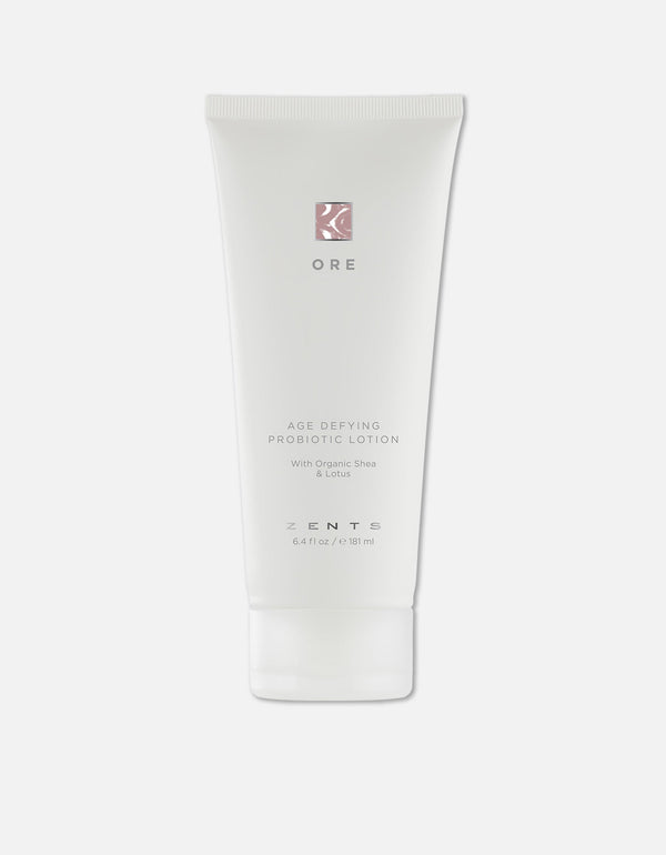 Tube of Age Defying Probiotic Lotion | Zents featuring organic shea and lotus, designed for skincare and body care to support wellness and rejuvenation.