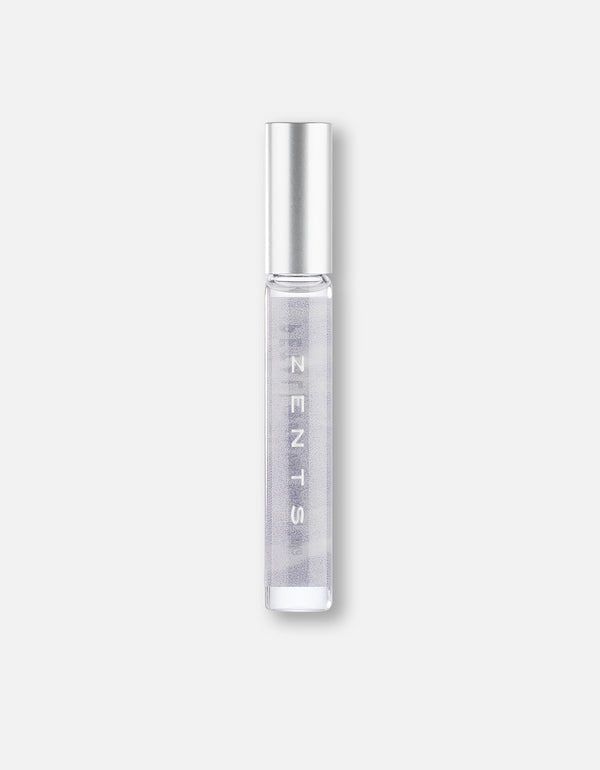 Clear glass roll-on bottle with silver cap containing a light purple fragrance labeled Attar Roll-on Scent | Zents for personal wellness and body care.