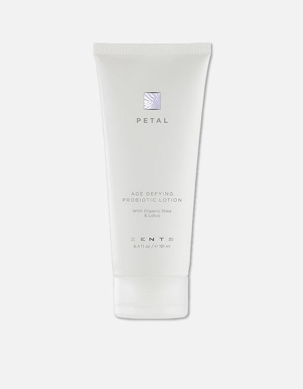White tube of Age Defying Probiotic Lotion | Zents with organic shea and lotus extract, designed for skincare and body care wellness.