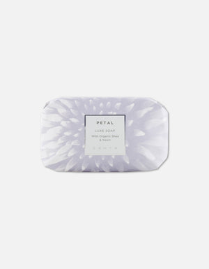 Bar of Luxe Soap Bar | Zents wrapped in soft lavender packaging featuring a floral petal design, promoting gentle skincare with organic shea and neem ingredients.
