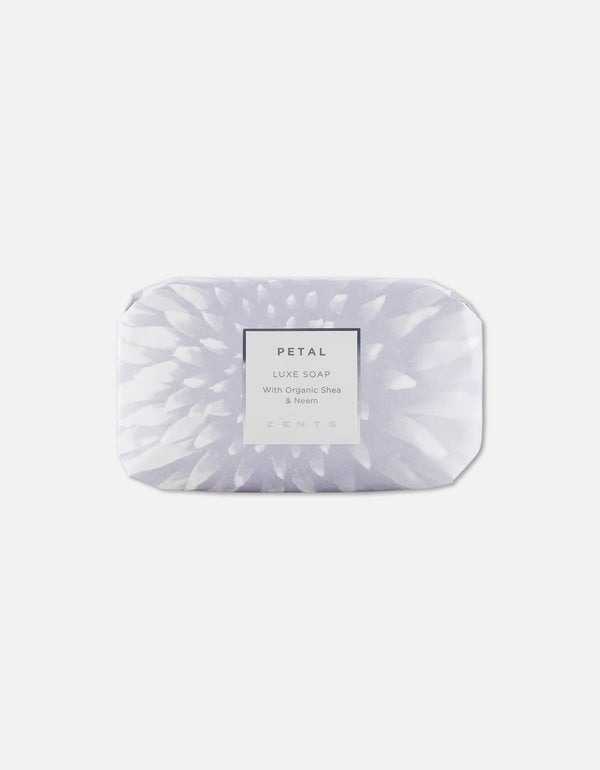 Bar of Luxe Soap Bar | Zents wrapped in soft lavender packaging featuring a floral petal design, promoting gentle skincare with organic shea and neem ingredients.