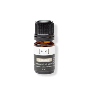 Small amber glass bottle of Breathe essential oil blend from Essential Oil Blends | Essence One, promoting wellness and natural therapeutic benefits.