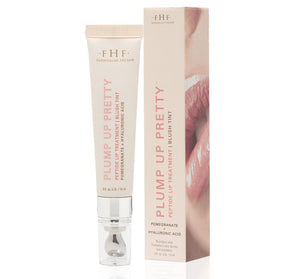 Plump Up Pretty Peptide Lip Treatment | Farmhouse Fresh in soft pink packaging with applicator beside box featuring close-up of lips, highlighting skincare and lip care benefits.
