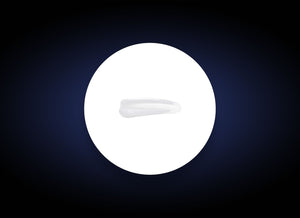 Close-up of a smooth, translucent swatch of Ideal Complex¨ Revitalizing Eye Gel | PCA Skin on a white circular background, highlighting its lightweight skincare texture.