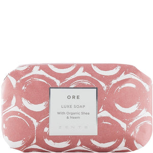 Luxe Soap Bar | Zents wrapped in artistic pink and white patterned paper, highlighting organic shea and neem ingredients for premium skincare and body care.