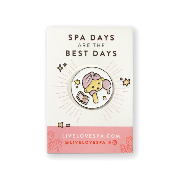 Fab Spa Life Enamel Pin - Limited Edition | Lucky Owl featuring a cute owl wearing a pink spa headband, holding a brush and jar of skincare cream, promoting wellness and self-care.
