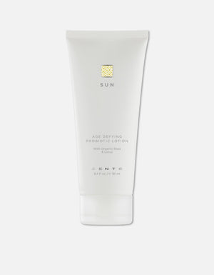 Minimalist white tube of Age Defying Probiotic Lotion | Zents designed for skincare with organic shea and lotus, promoting body care and wellness benefits.