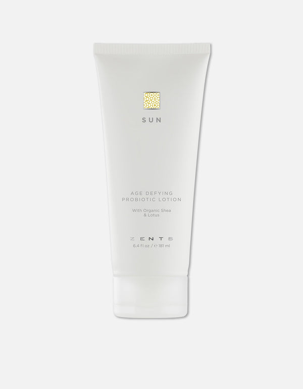 Minimalist white tube of Age Defying Probiotic Lotion | Zents designed for skincare with organic shea and lotus, promoting body care and wellness benefits.