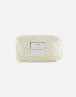 Luxe Soap Bar | Zents in light yellow decorative wrapping labeled Sun Luxe Soap with organic shea and neem, designed for skincare and body care wellness.