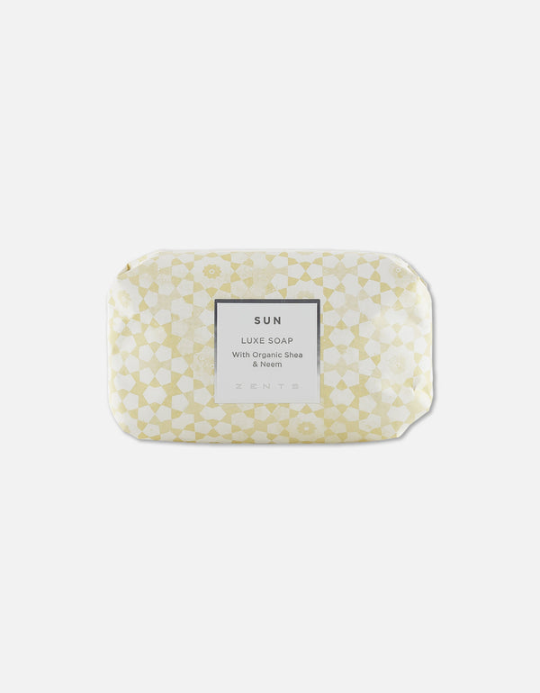 Luxe Soap Bar | Zents in light yellow decorative wrapping labeled Sun Luxe Soap with organic shea and neem, designed for skincare and body care wellness.