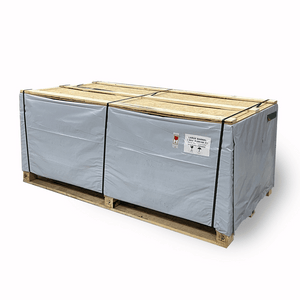 Wooden pallet crate covered with a gray protective wrap and secured with black straps containing the FD2 Sauna - 2 Person | Western Sol packaging for safe transport and storage.